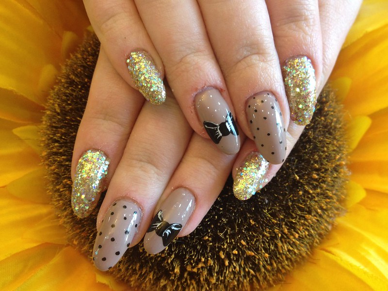 7 Stunning Black and Gold Nail Designs For Every Occasion
