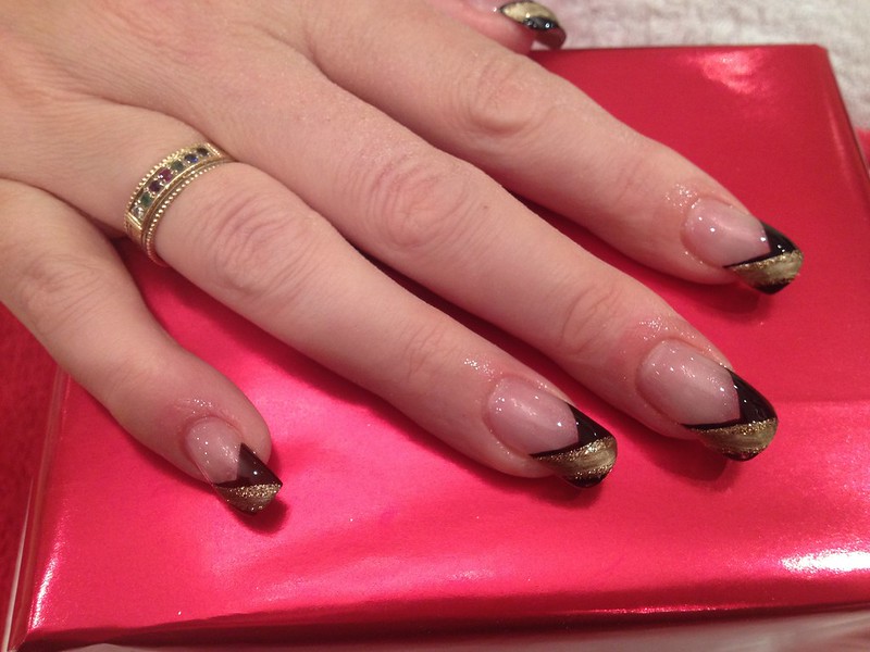 7 Stunning Black and Gold Nail Designs For Every Occasion